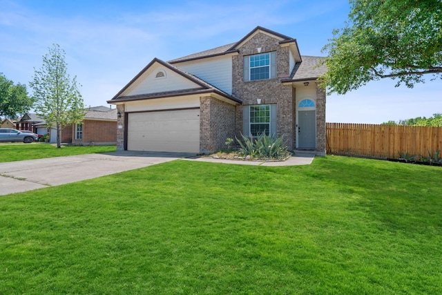 traditional-style house with a front lawn, fence, driveway, and a garage