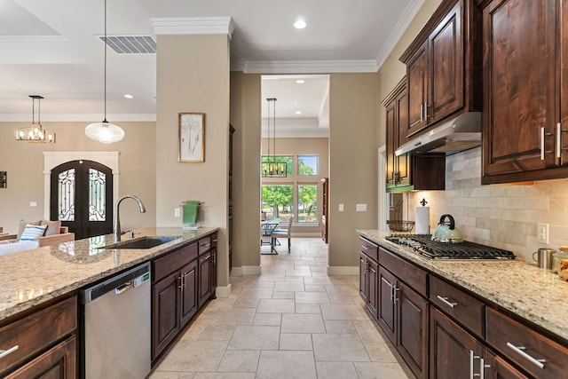 kitchen featuring under cabinet range hood, stainless steel appliances, visible vents, french doors, and a sink