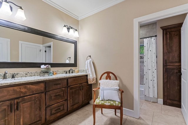 bathroom with curtained shower, a sink, double vanity, and crown molding