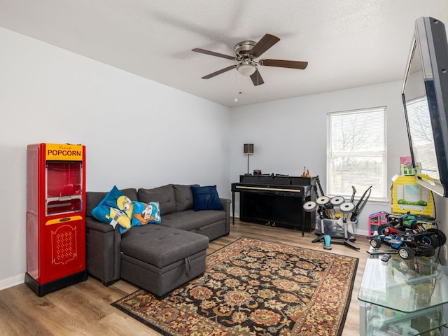 16019 Dark Ln, Austin, TX 78717 - living area with wood finished floors, a ceiling fan, and baseboards
