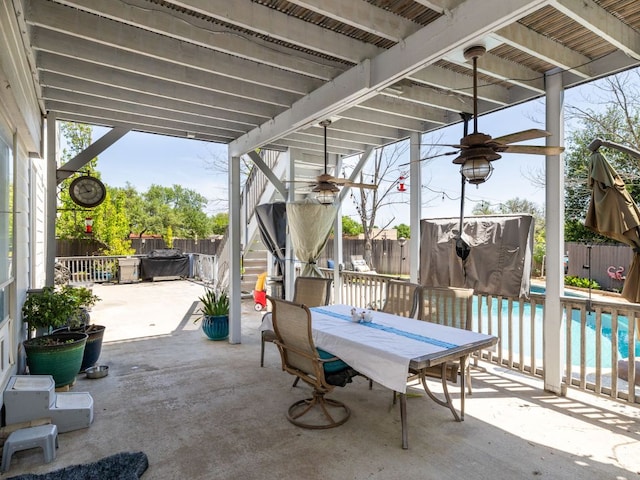 16019 Dark Ln, Austin, TX 78717 - fenced backyard featuring a patio area, outdoor dining space, and a ceiling fan