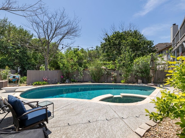 16019 Dark Ln, Austin, TX 78717 - view of swimming pool with a fenced backyard, a patio area, and a pool with connected hot tub