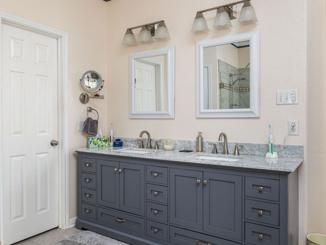 16019 Dark Ln, Austin, TX 78717 - full bath featuring double vanity, a shower, and tile patterned flooring