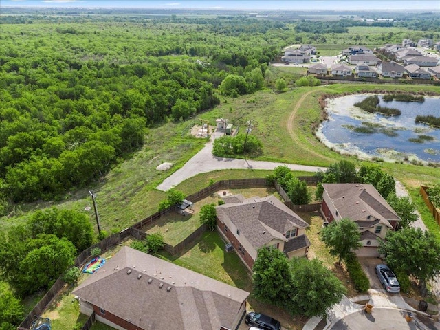 13625 Coomer Path, Pflugerville, TX 78660 - aerial view of property and surrounding area with a forest, nearby suburban area, and a nearby body of water
