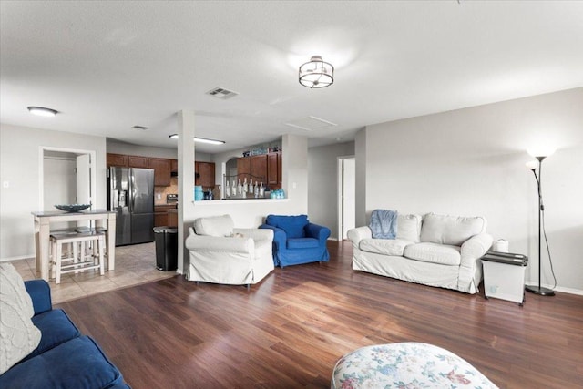 13625 Coomer Path, Pflugerville, TX 78660 - living area with wood finished floors and baseboards