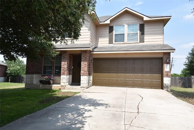 13625 Coomer Path, Pflugerville, TX 78660 - view of front of home with an attached garage, brick siding, driveway, and stone siding