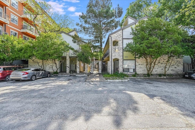 2815 Rio Grande St Unit 211, Austin, TX 78705 - view of property featuring uncovered parking