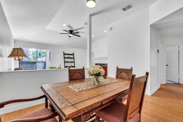 dining area featuring recessed lighting, visible vents, a ceiling fan, light wood-type flooring, and baseboards