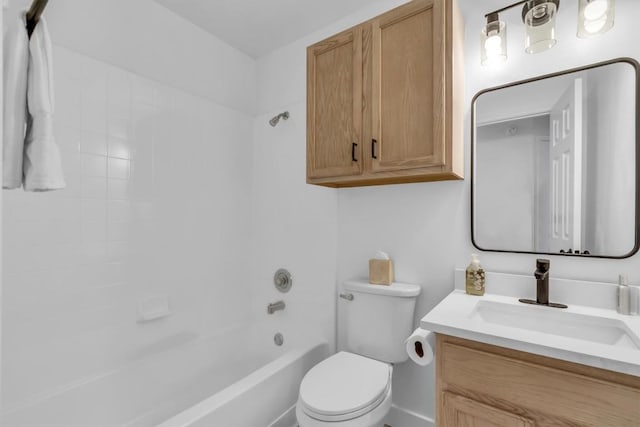 bathroom with shower / bath combination, vanity, and toilet
