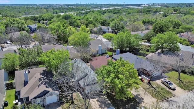 birds eye view of property with a residential view