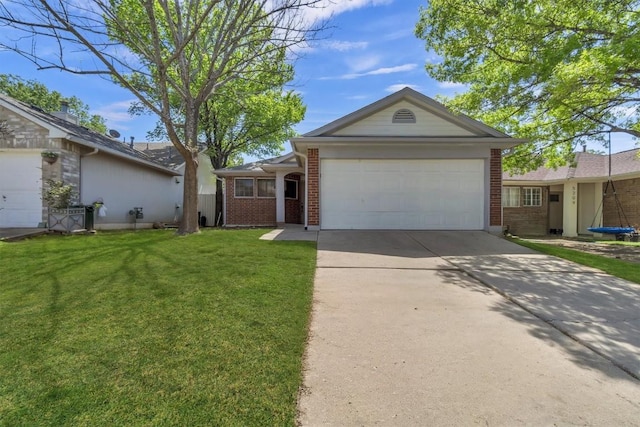 single story home with brick siding, an attached garage, a front yard, and driveway