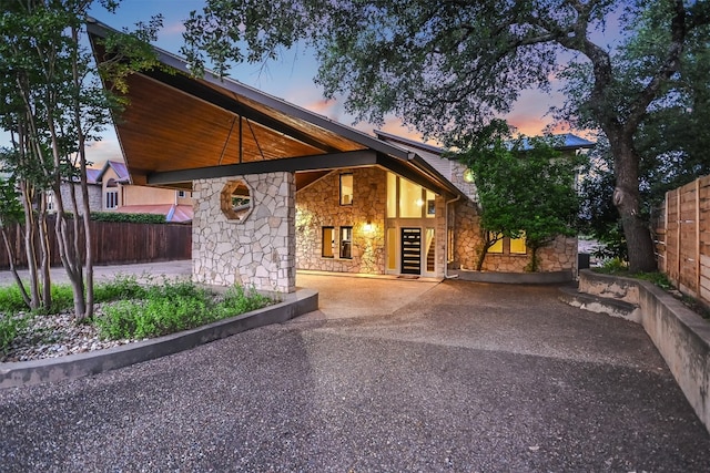 22401 Felicia Dr, Spicewood, TX 78669 - view of front of home featuring stone siding
