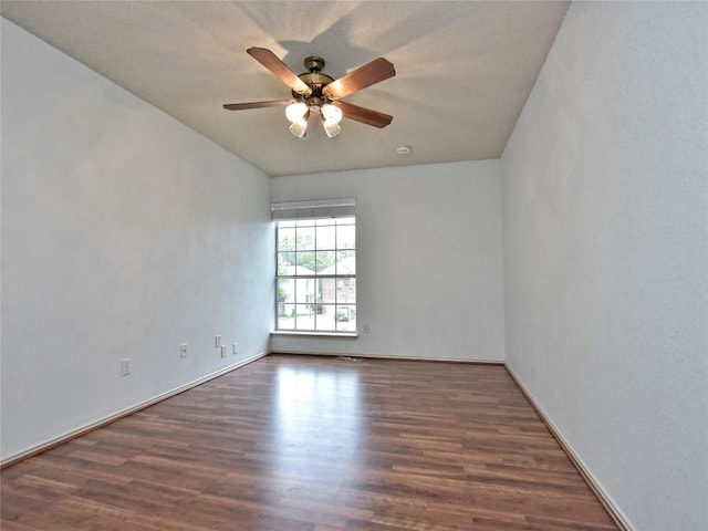 8411 Glen Canyon Dr, Round Rock, TX 78681 - unfurnished room featuring wood finished floors, a ceiling fan, and baseboards