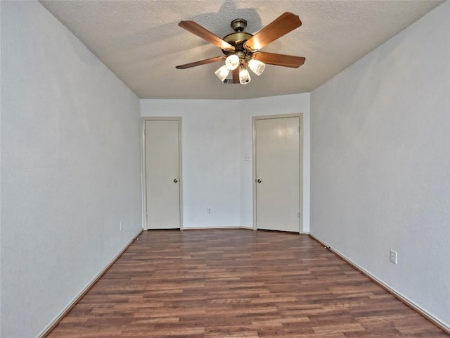 8411 Glen Canyon Dr, Round Rock, TX 78681 - unfurnished room featuring a ceiling fan, wood finished floors, a textured ceiling, and baseboards