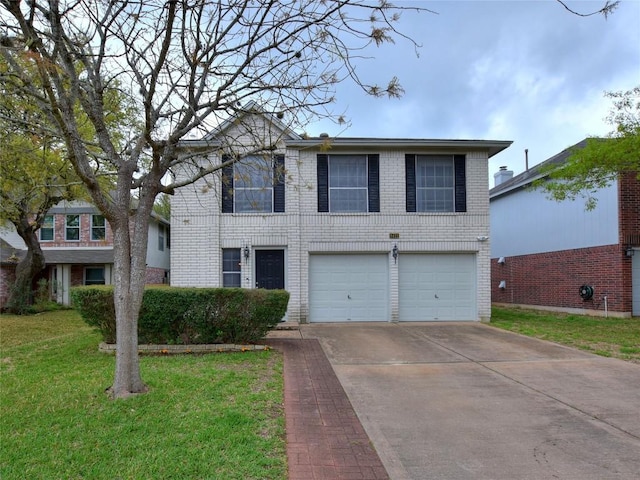 8411 Glen Canyon Dr, Round Rock, TX 78681 - view of front of property with an attached garage, concrete driveway, brick siding, and a front lawn
