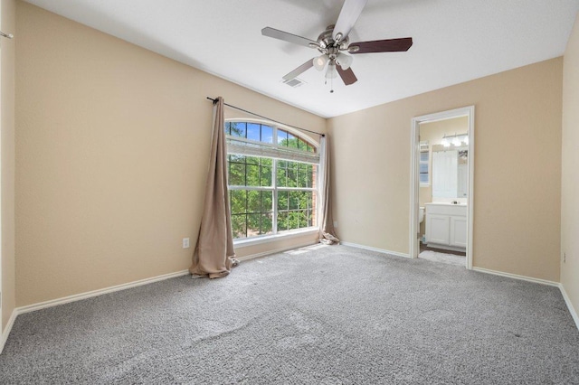13321 Kirkglen Dr, Austin, TX 78727 - spare room featuring carpet flooring, ceiling fan, and baseboards