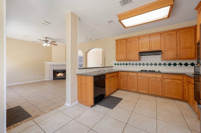 13321 Kirkglen Dr, Austin, TX 78727 - kitchen with black appliances, ceiling fan, backsplash, a sink, and light tile patterned floors