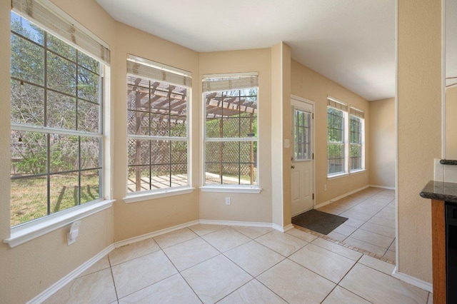 13321 Kirkglen Dr, Austin, TX 78727 - unfurnished dining area featuring light tile patterned floors and baseboards