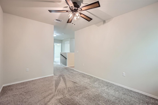 10504 Abana Way, Austin, TX 78748 - empty room featuring light carpet, ceiling fan, and attic access