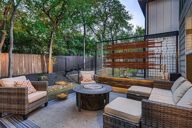 10504 Abana Way, Austin, TX 78748 - fenced backyard with a patio and an outdoor living space with a fire pit