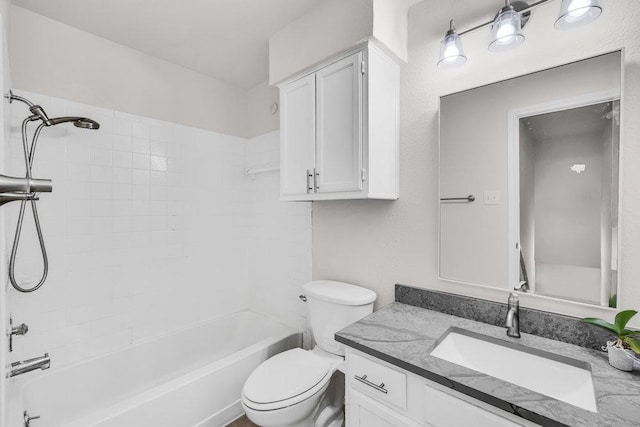 6906 Tesoro Trl, Austin, TX 78729 - bathroom with vanity, toilet, and bathtub / shower combination