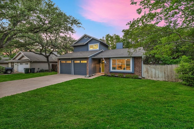 6906 Tesoro Trl, Austin, TX 78729 - view of front of home featuring a chimney, driveway, and brick siding