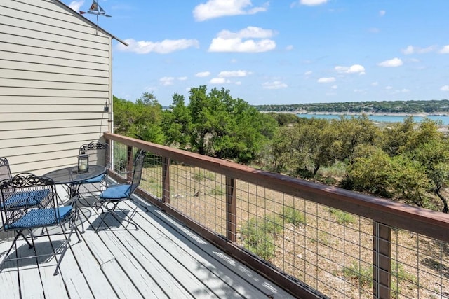 deck featuring a water view