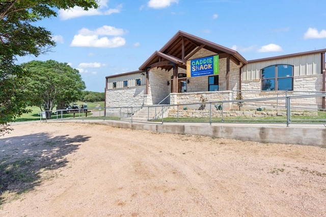 view of front of property with stone siding