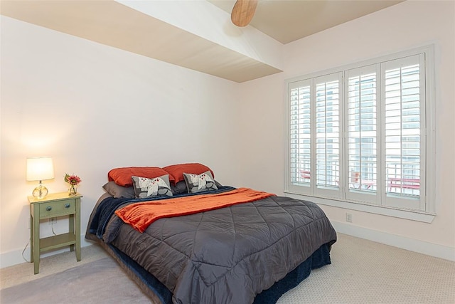 603 Davis St Unit 1506, Austin, TX 78701 - carpeted bedroom featuring baseboards and a ceiling fan