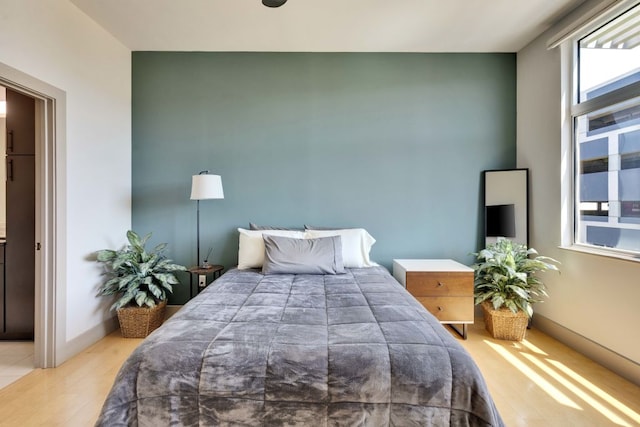 1320 Robert Browning St Unit 409, Austin, TX 78723 - bedroom with wood finished floors