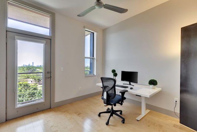 1320 Robert Browning St Unit 409, Austin, TX 78723 - office area featuring wood finished floors, baseboards, and a ceiling fan