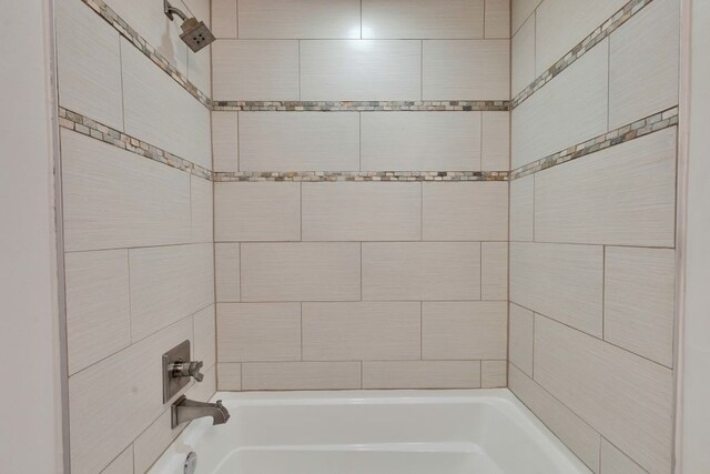 1320 Robert Browning St Unit 409, Austin, TX 78723 - bathroom featuring tub / shower combination