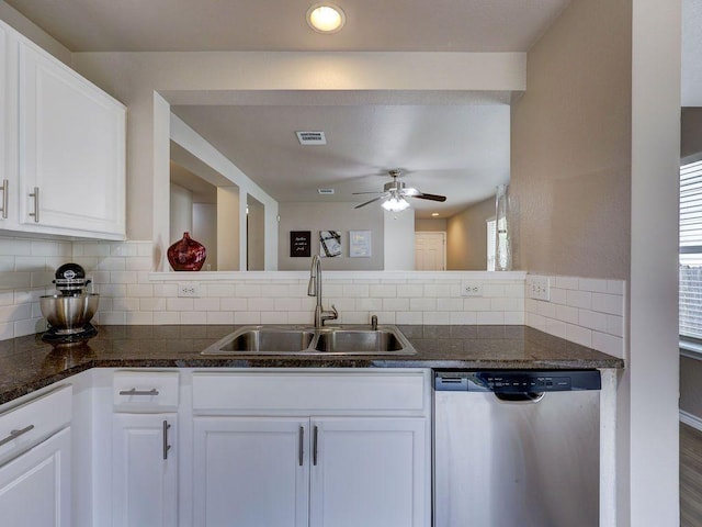 6709 Doyal Dr, Austin, TX 78747 - kitchen featuring dishwasher, a sink, a ceiling fan, and white cabinetry
