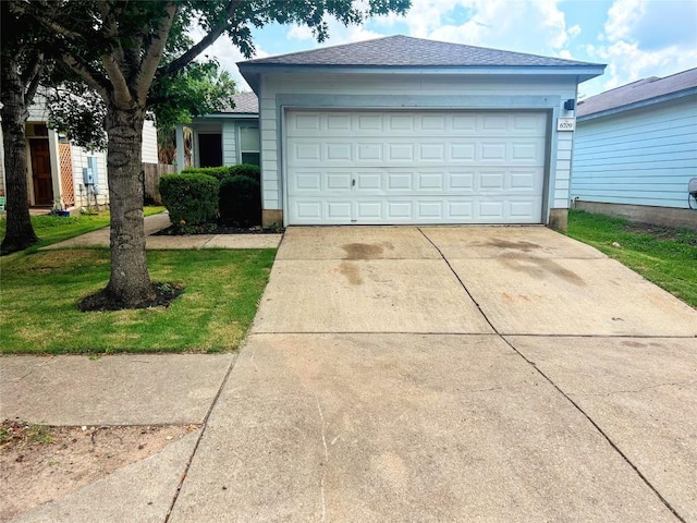 6709 Doyal Dr, Austin, TX 78747 - single story home with driveway and an attached garage