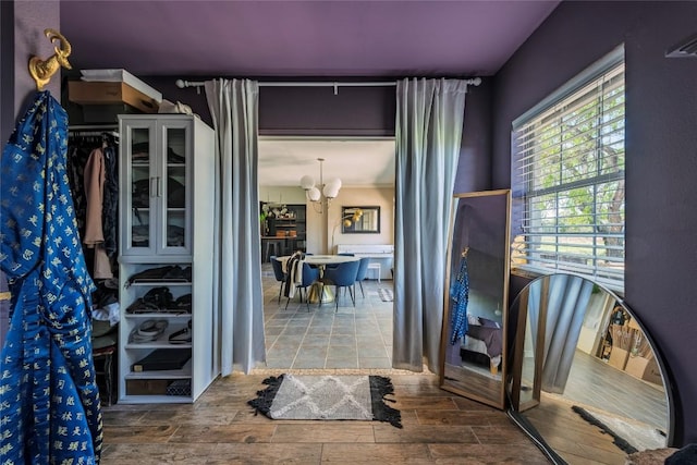 358 Easley Rd, Smithville, TX 78957 - interior space with wood finish floors and a chandelier