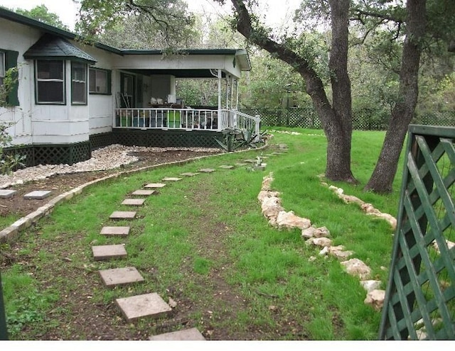 view of yard featuring fence