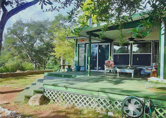 18201 Gregg Bluff Rd, Jonestown, TX 78645 - view of tennis court with a ceiling fan and a wooden deck