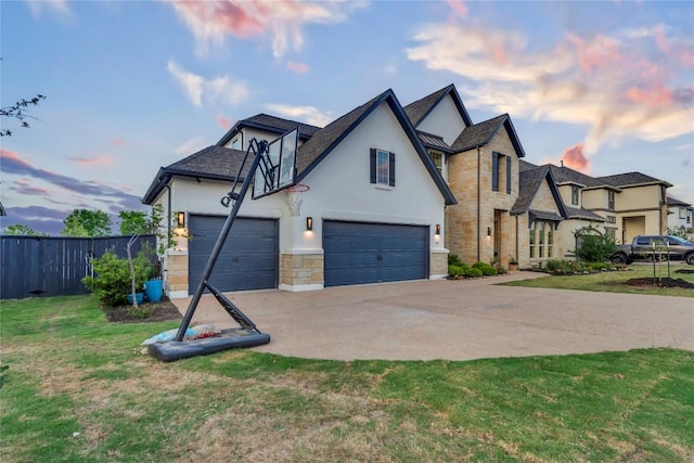 2616 War Wagon Way, Leander, TX 78641 - view of front of house featuring stucco siding, stone siding, driveway, a garage, and roof with shingles