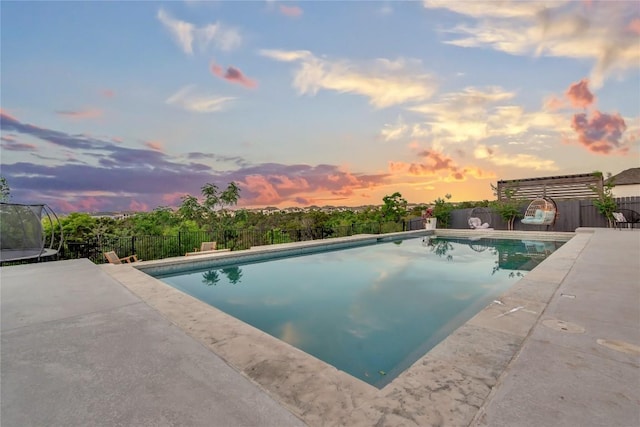 2616 War Wagon Way, Leander, TX 78641 - pool at dusk featuring a fenced backyard and a patio