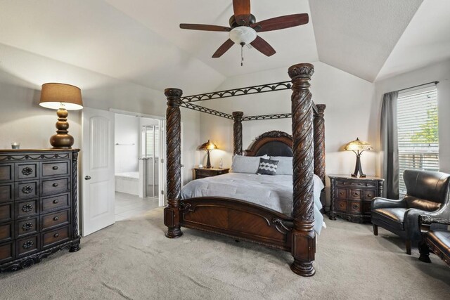 5679 Corsica Loop, Round Rock, TX 78665 - bedroom featuring carpet floors, vaulted ceiling, connected bathroom, and ceiling fan