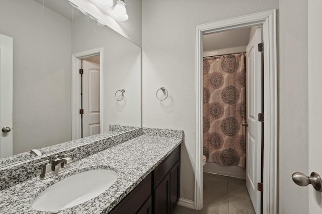 5679 Corsica Loop, Round Rock, TX 78665 - bathroom featuring vanity, tile patterned flooring, and curtained shower