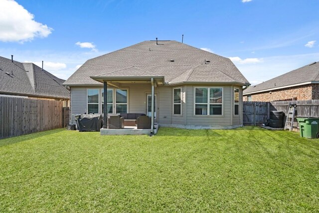 5679 Corsica Loop, Round Rock, TX 78665 - rear view of house featuring outdoor lounge area, a fenced backyard, and a shingled roof