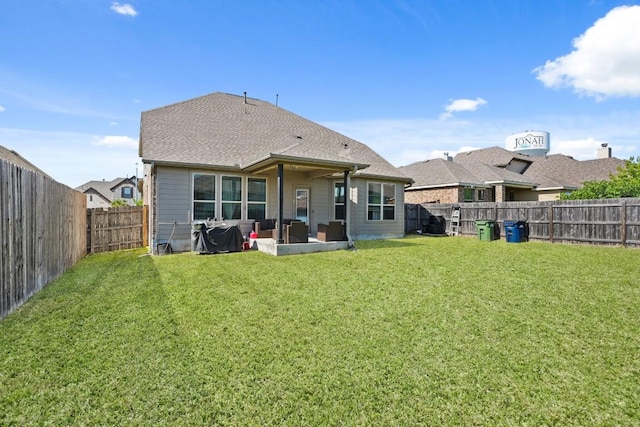 5679 Corsica Loop, Round Rock, TX 78665 - back of property featuring a fenced backyard, a patio, an outdoor hangout area, and roof with shingles