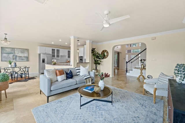 10012 Scull Creek Dr, Austin, TX 78730 - living area featuring ornamental molding, arched walkways, a ceiling fan, stairway, and recessed lighting