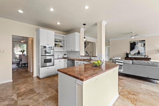 10012 Scull Creek Dr, Austin, TX 78730 - kitchen with a ceiling fan, stainless steel appliances, open shelves, white cabinetry, and recessed lighting