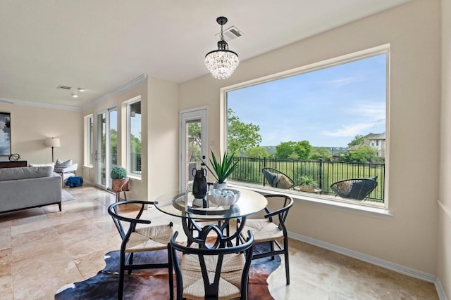 10012 Scull Creek Dr, Austin, TX 78730 - dining area with baseboards, a chandelier, ornamental molding, and light tile patterned floors