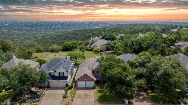 10012 Scull Creek Dr, Austin, TX 78730 - aerial view at dusk of a wooded view