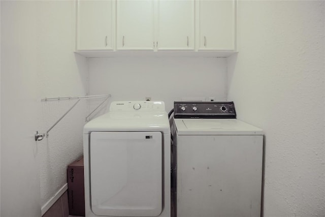 1908 Trevino Dr, Austin, TX 78746 - laundry room with independent washer and dryer and cabinet space