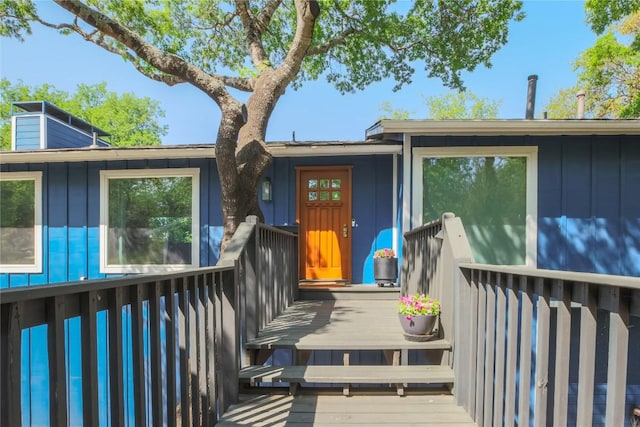 1908 Trevino Dr, Austin, TX 78746 - view of exterior entry featuring board and batten siding