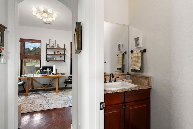 45 Saddle Rock Rdg, Wimberley, TX 78676 - bathroom featuring visible vents, vanity, and concrete flooring